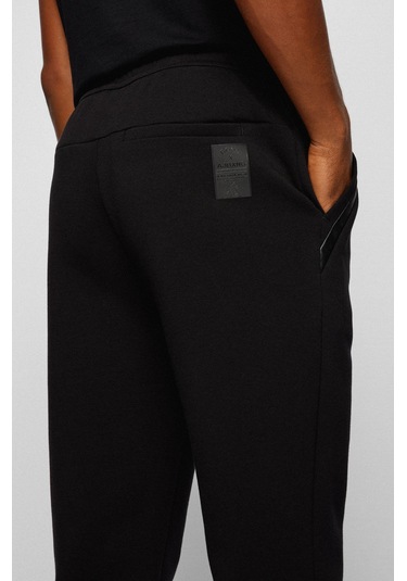 HUGO BOSS JERSEY TROUSERS PAMUK KARIŞIMLI, KAVİSLİ LOGOLU EŞOFMAN Siyah