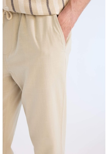 DeFacto %100 Pamuk Keten Görünümlü Yazlık Jogger Pantolon - Dar Paça Beli Bağcıklı Lastikli Cepli Z6475AZ25SPBG700 DeFacto %100 Pamuk Keten Görünümlü Yazlık Jogger Pantolon - Dar Paça Beli Bağcıklı Lastikli Cepli Z6475AZ25SPBG700