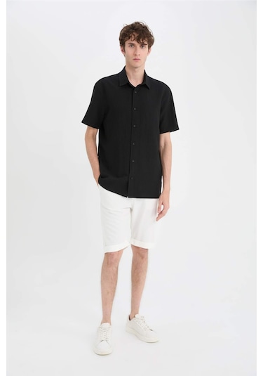 DeFacto Regular Fit Polo Yaka Krinkıl Yazlık Kısa Kollu Siyah Gömlek E1223AX25SMBK27 DeFacto Regular Fit Polo Yaka Krinkıl Yazlık Kısa Kollu Siyah Gömlek E1223AX25SMBK27