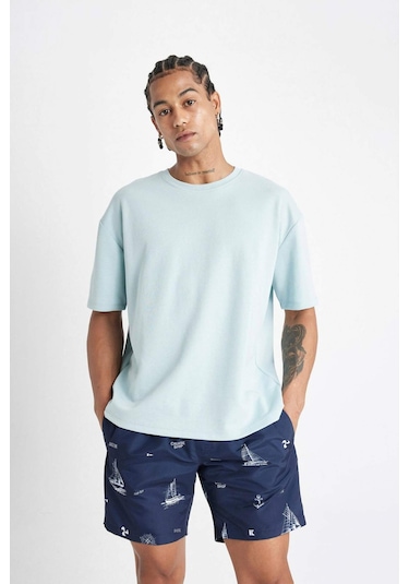 DeFacto Regular Fit Desenli File Astarlı Kısa Boy Deniz Şortu M8344AZ24HSNV256 DeFacto Regular Fit Desenli File Astarlı Kısa Boy Deniz Şortu M8344AZ24HSNV256
