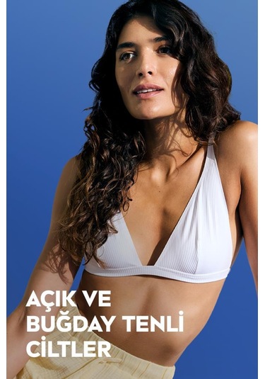 NIVEA Q10 Sıkılaştırıcı Ve Kademeli Bronzlaştırıcı Vücut Losyonu 400 ML