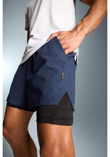 DeFactoFit Slim Fit Dar Kesim Sporcu Taytlı Şort E2759AX25SMNV94