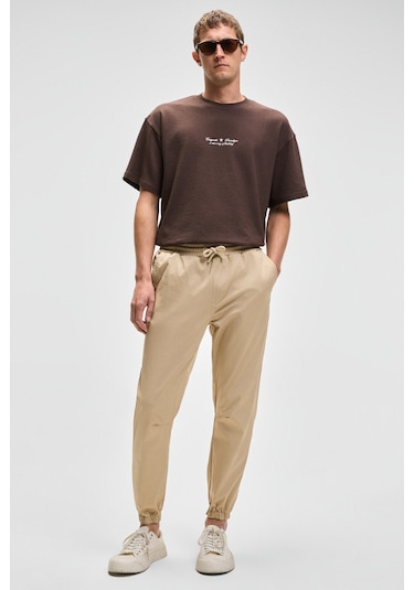 Jakob Erkek Dokuma Yıkamalı 4 Cepli Kalın Dokulu Paçası Lastikli Bej Pantolon