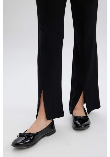 DeFacto Kız Çocuk Flare Fit Yırtmaçlı Pantolon B6893A825SMBK81 Siyah