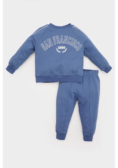 DeFacto Erkek Bebek 2'li Takım Baskılı Sweatshirt Esnek Belli Eşofman Altı D2599A525SPBE341 Mavi DeFacto Erkek Bebek 2'li Takım Baskılı Sweatshirt Esnek Belli Eşofman Altı D2599A525SPBE341 Mavi