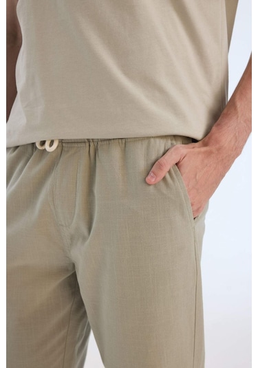 DeFacto %100 Pamuk Keten Görünümlü Yazlık Jogger Pantolon Dar Paça Beli Bağcıklı Lastikli Cepli Z6475AZ25SPKH404