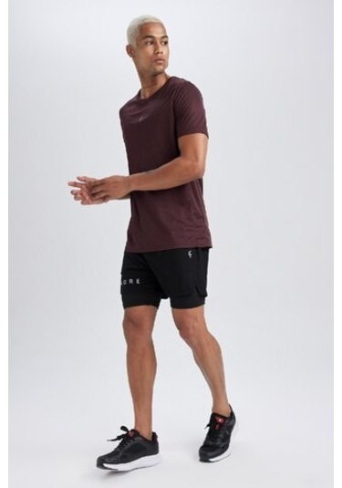 DeFactoFit Slim Fit Dar Kesim Fermuarlı Telefon Cepli Sporcu Taytlı Şort Z2147AZ23AUBK81