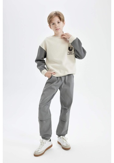 DeFacto Erkek Çocuk Bağcıklı Beli ve Paçası Lastikli Cepli Jogger Gabardin Pantolon C7577A824WNKH401