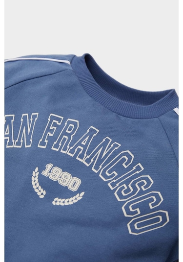 DeFacto Erkek Bebek 2'li Takım Baskılı Sweatshirt Esnek Belli Eşofman Altı D2599A525SPBE341 Mavi DeFacto Erkek Bebek 2'li Takım Baskılı Sweatshirt Esnek Belli Eşofman Altı D2599A525SPBE341 Mavi