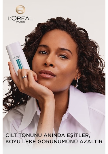 L'Oréal Paris Bright Reveal Koyu Leke Karşıtı Renkli Fluid Günlük Yüz Güneş Kremi SPF50 Medium 50 ML