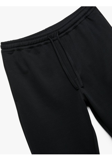 Koton Straight Fit Pike Kumaş Cep Detaylı Rahat Kesim Beli Bağcıklı Pantolon Lacivert 6wam40006hk Lacivert