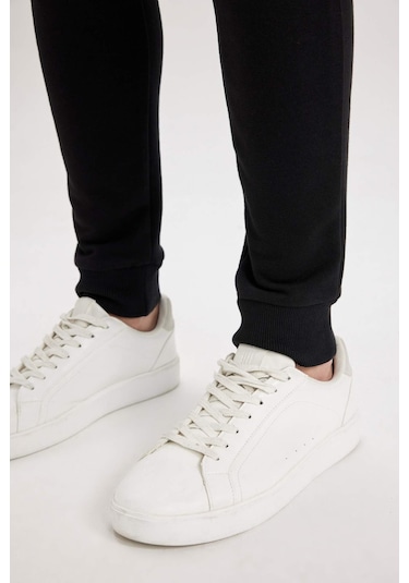 DeFacto Jogger Eşofman Altı Slim Fit Dar Kesim Beli Bağcıklı Lastikli Paça Fermuar Cepli A4387AX24AUBK81 DeFacto Jogger Eşofman Altı Slim Fit Dar Kesim Beli Bağcıklı Lastikli Paça Fermuar Cepli A4387AX24AUBK81