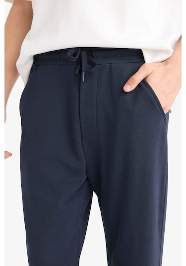 Defacto Regular Fit Basic Düz Beli Bağcıklı Düz Paça Cepli Eşofman Altı D6762AX25AU Lacivert Defacto Regular Fit Basic Düz Beli Bağcıklı Düz Paça Cepli Eşofman Altı D6762AX25AU Lacivert