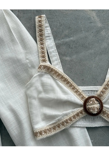 Şeritli Çift Tokalı Natürel Dokulu Keten Kumaşlı Palazzo Pantolon Sırt Lastikli Üçgen Krop Takım Beyaz Şeritli Çift Tokalı Natürel Dokulu Keten Kumaşlı Palazzo Pantolon Sırt Lastikli Üçgen Krop Takım Beyaz