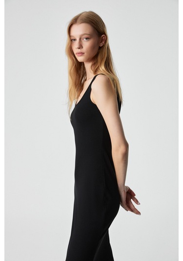 SOFUTEY Kadın Slim Kolsuz Oyuk Yaka Düz Paça Siyah Elbise