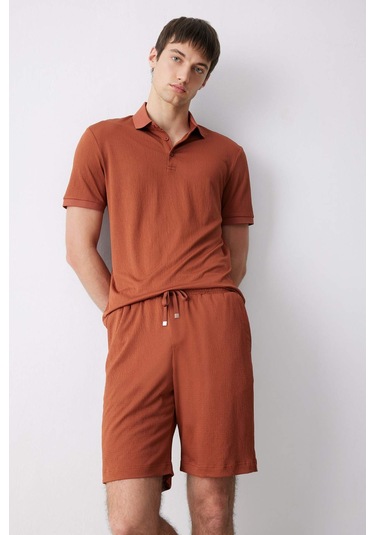 DeFacto Slim Fit Dar Kesim Polo Yaka Dokulu Kısa Kollu Krinkıl Tişört E1222AX25SMBN312