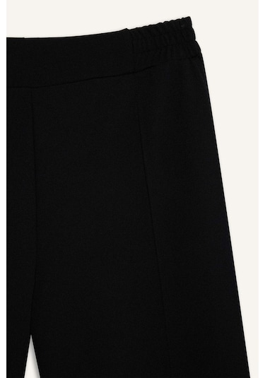 DeFacto Krep Pantolon Carrot Fit Basic Düz Beli Lastikli Dar Paça Cepli D5950AX24WNBK81 Siyah