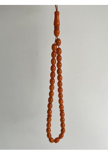 Oval Kesim Kokulu Toz Kehribar Tesbih 33lük 7mm A008