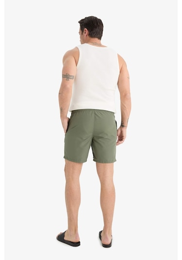 DeFacto Regular Fit Kısa Boy Cepli File Astarlı Beli Bağcıklı Düz Hafif Kumaş Deniz Şortu E5133AXNSKH109 DeFacto Regular Fit Kısa Boy Cepli File Astarlı Beli Bağcıklı Düz Hafif Kumaş Deniz Şortu E5133AXNSKH109