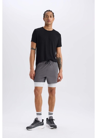 DeFactoFit Slim Fit Dar Kesim Sporcu Taytlı Şort E2760AX25SMAR58