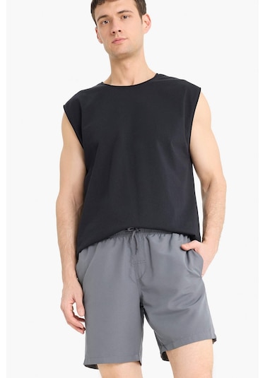 DeFacto Regular Fit Kısa Boy Cepli File Astarlı Beli Bağcıklı Düz Hafif Kumaş Deniz Şortu E5133AXNSGR474