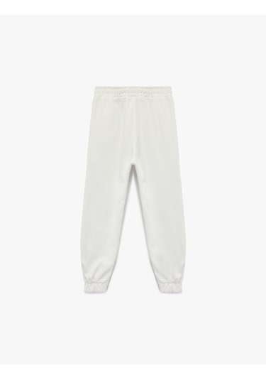 Koton Şardonlu Beli Lastikli Baskılı Jogger Eşofman Altı Ekru 6wkg40049ak Ekru
