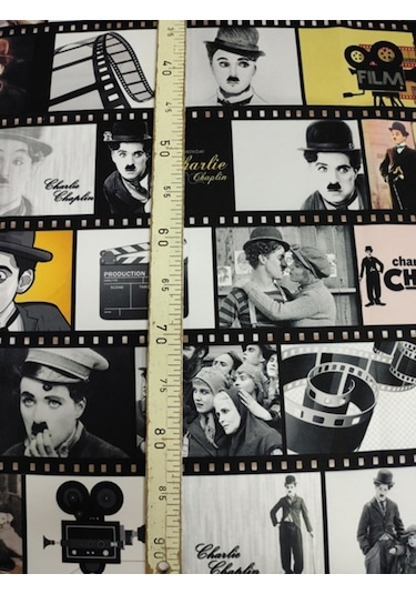 Film Şeridi Içende Charlie Chaplin Desenli Kumaş