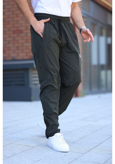 Erkek Haki Baggy Eşofman Altı Fermuarlı Paça Kaliteli Paraşüt Kumaş Haki Erkek Haki Baggy Eşofman Altı Fermuarlı Paça Kaliteli Paraşüt Kumaş Haki