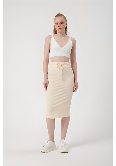 Bej Beli Lastikli Spor Kalem Etek