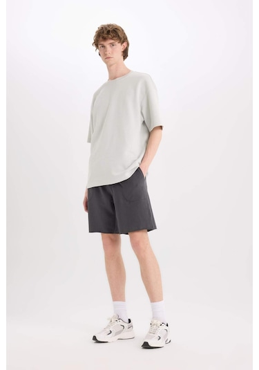 DeFacto %100 Pamuk Slim Fit Dar Kesim Dar Paça Cepli Basic Düz Şort B8673AX25SMAR104