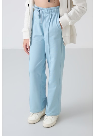 Açık Mavi Cepli Ön Dikiş Detaylı Geniş Paça Kız Çocuk Eşofman Altı -75144 Açık Mavi