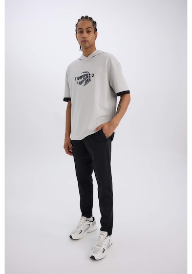 DeFactoFit Sporcu Jogger Eşofman Altı Slim Fit Dar Kesim Standart Paça Skuba Dalgıç Kumaş Beli Lastikli Düz Paça E3930AX24WNBK81 Siyah