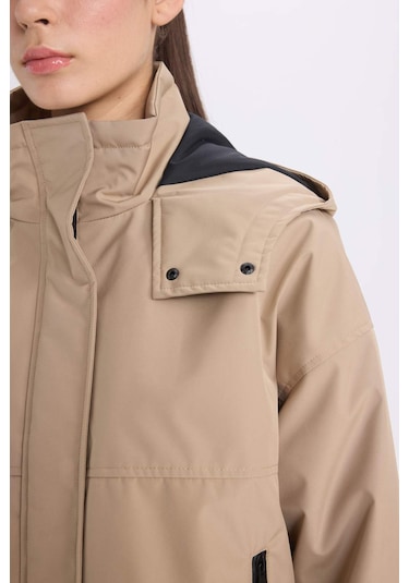 DeFacto Su Geçirmez Kapüşonlu Fermuarlı Çıtçıtlı Cepli Mevsimlik Mont D0931AX25SPBG778 Bej