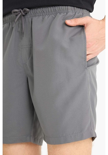 DeFacto Regular Fit Kısa Boy Cepli File Astarlı Beli Bağcıklı Düz Hafif Kumaş Deniz Şortu E5133AXNSGR474