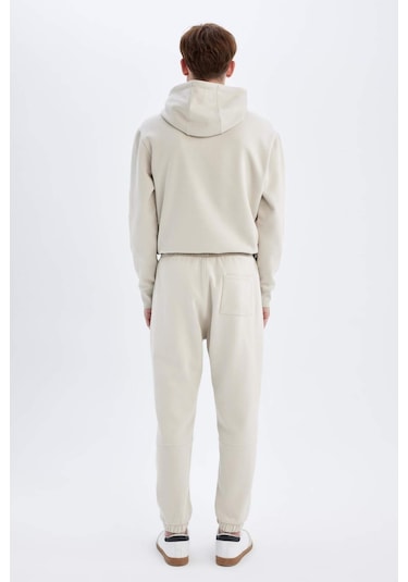 DeFacto Regular Fit Eşofman Altı Cepli Beli Bağcıklı Lastikli Paça B6155AX24AUBG766 Bej DeFacto Regular Fit Eşofman Altı Cepli Beli Bağcıklı Lastikli Paça B6155AX24AUBG766 Bej