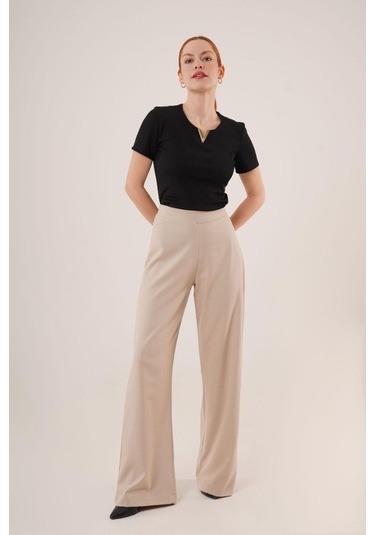 The İstanbul Bol Paça Yandan Fermuarlı Krem Kumaş Pantolon Krem