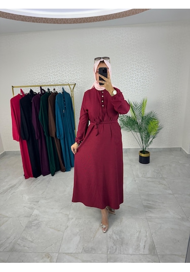 Kadın Bordo Karin Aerobin Kumaş Yarım Ön Düğmeli Püskül Bağcık Kuşaklı Tesettür Elbise Bordo