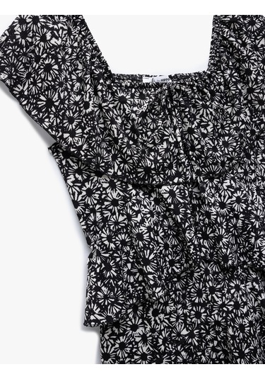 Koton Bürümcük Kayık Yaka Kolsuz Volanlı Katlı Çiçekli Mini Tulum Siyah Desenli 5sal40086ık Siyah Desenli Siyah