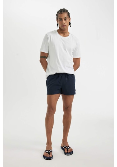 DeFactoFit Andy Baskılı Esnek Dokulu Kısa Boy Sporcu Deniz Şortu B5987AX24HSNV146 Lacivert