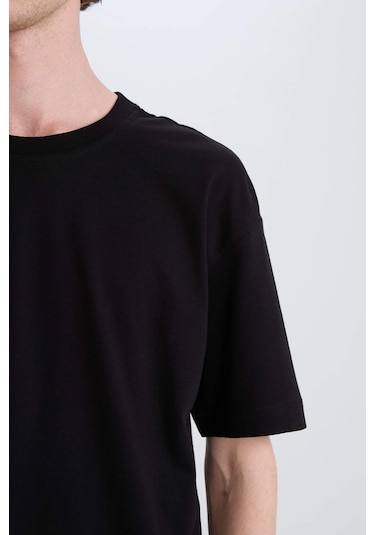 DeFacto Oversize Geniş Kalıp Bisiklet Yaka Basic Düz Kısa Kollu Siyah Tişört E6885AXNSBK81 DeFacto Oversize Geniş Kalıp Bisiklet Yaka Basic Düz Kısa Kollu Siyah Tişört E6885AXNSBK81