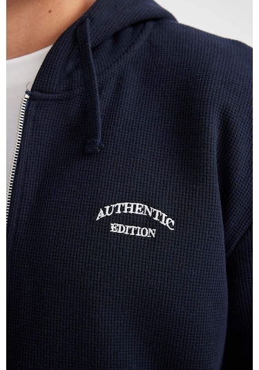 DeFacto Lacivert Relax Fit Kapüşonlu Waffle Baskılı Cepli Fermuarlı Sweatshirt D2629AX24AUNV71 Lacivert