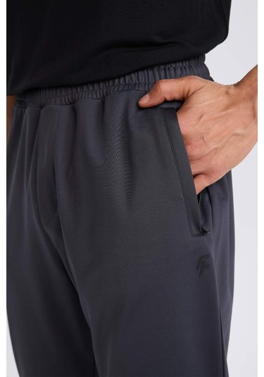 DeFactoFit Sporcu Jogger Eşofman Altı Slim Fit Dar Kesim Standart Paça Skuba Dalgıç Kumaş Beli Lastikli Düz Paça E3930AX24WNAR206 Antrasit