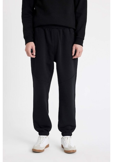 DeFacto Regular Fit Jogger Eşofman Altı Fermuar Cepli Lastikli Paça Y5511AZ24AUBK81 DeFacto Regular Fit Jogger Eşofman Altı Fermuar Cepli Lastikli Paça Y5511AZ24AUBK81