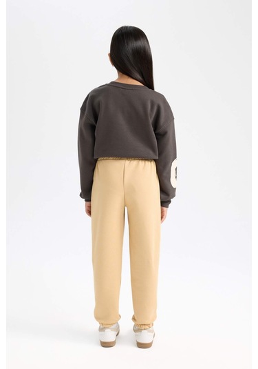 DeFacto Kız Çocuk Standart Fit Beli Paçası Lastikli Baskılı Jogger Eşofman Altı D2295A824WNBG68 Bej DeFacto Kız Çocuk Standart Fit Beli Paçası Lastikli Baskılı Jogger Eşofman Altı D2295A824WNBG68 Bej