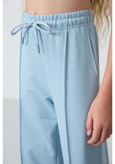 Açık Mavi Cepli Ön Dikiş Detaylı Geniş Paça Kız Çocuk Eşofman Altı -75144 Açık Mavi