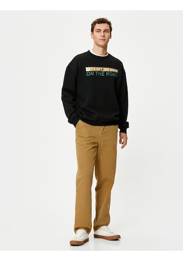 Koton Arkası Baskılı Sweat Sloganlı Rahat Kesim Bisiklet Yaka Siyah 4wam70394mk Siyah