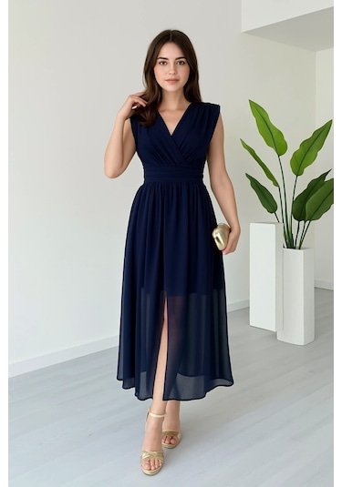 Kadın Vatkalı Şifon Kolsuz Kruvaze Yaka Yırtmaç Detaylı Şık Midi Elbise Lacivert