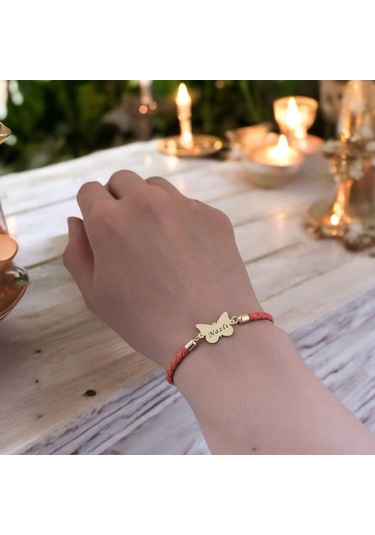 Nazlı İsmine Özel 14 Ayar Altın Plakalı Turuncu Derili Kelebek Motifli Hediye Bileklik-502isim Nazlı