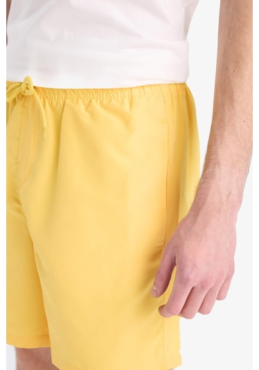 DeFacto Regular Fit Kısa Boy Cepli File Astarlı Beli Bağcıklı Düz Hafif Kumaş Deniz Şortu E5133AXNSYL190 DeFacto Regular Fit Kısa Boy Cepli File Astarlı Beli Bağcıklı Düz Hafif Kumaş Deniz Şortu E5133AXNSYL190
