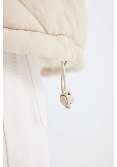 DeFacto Su İtici Puffer Şişme Mont Kapitoneli İçi Suni Kürklü Rüzgar Geçirmez Cepli A0756AX24WNER132 Ekru